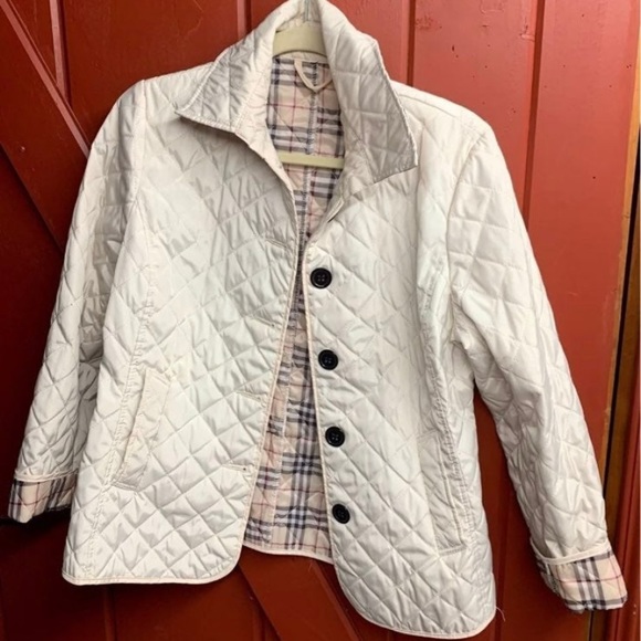 Quilted rain jacket - Picture 1 of 3